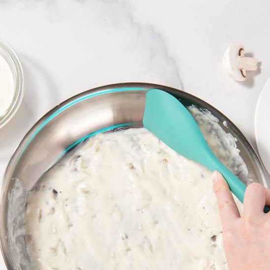 spatule en silicone verte racle bol